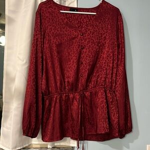 Cheetah print blouse elastic around waist area